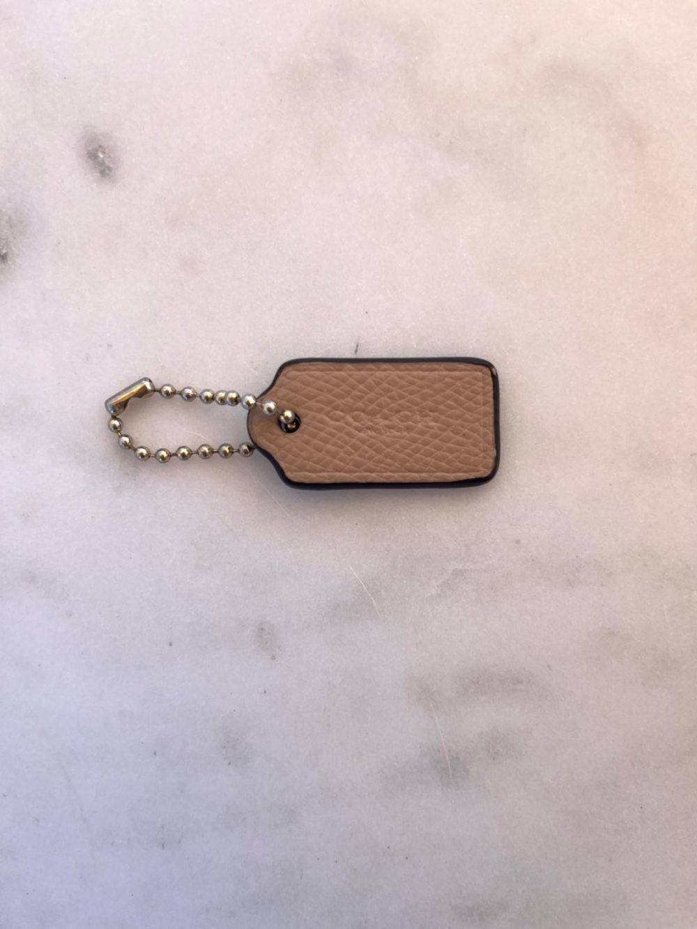 COACH Mini Pebbled Leather Hang Tag, Beige